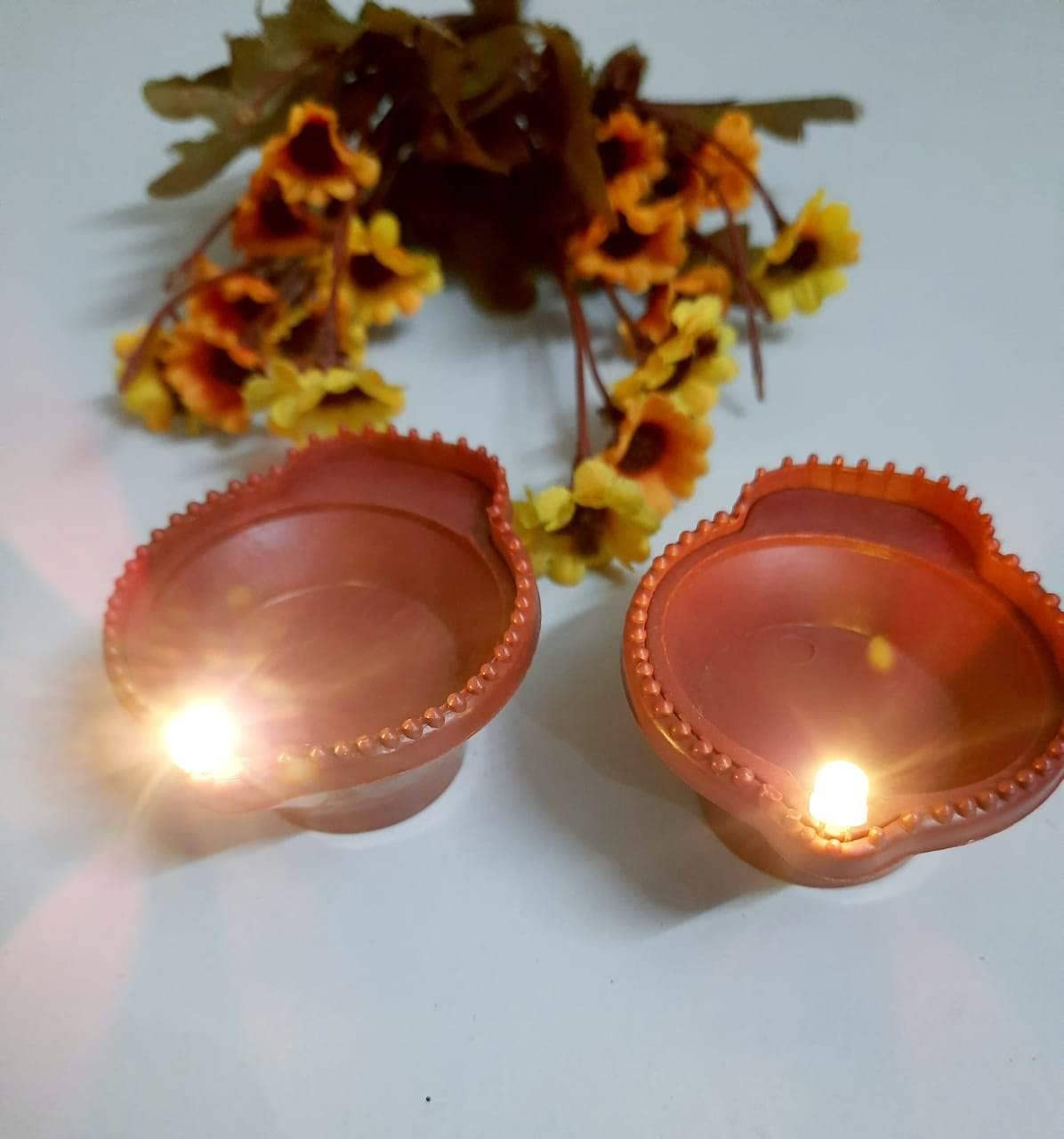Buy ROTE KIRSCHE Water Sensor Eco-Friendly Led Diyas Candle E-Diya,Warm  Orange Ambient Lights,Battery Operated Led Candles for Home Decor,  Festivals Decoration Diwali Lights Diva (Sensor Led Diya (4 Pcs) Online at  Best